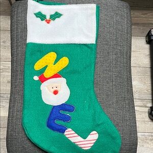 Festive Green Christmas Stocking with Santa Design